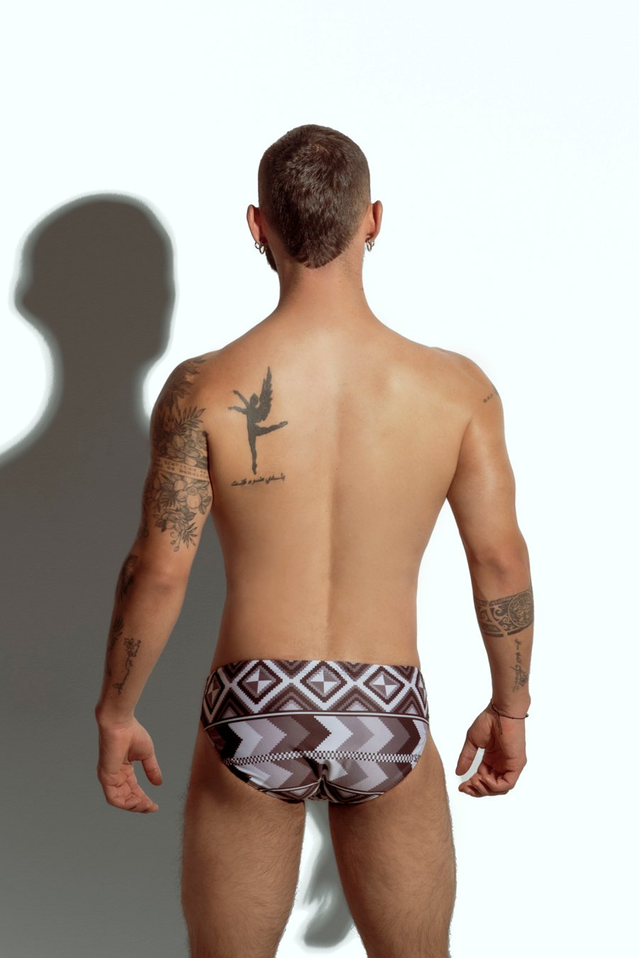 Men's tribal print swim brief for gay men, stylish and bold