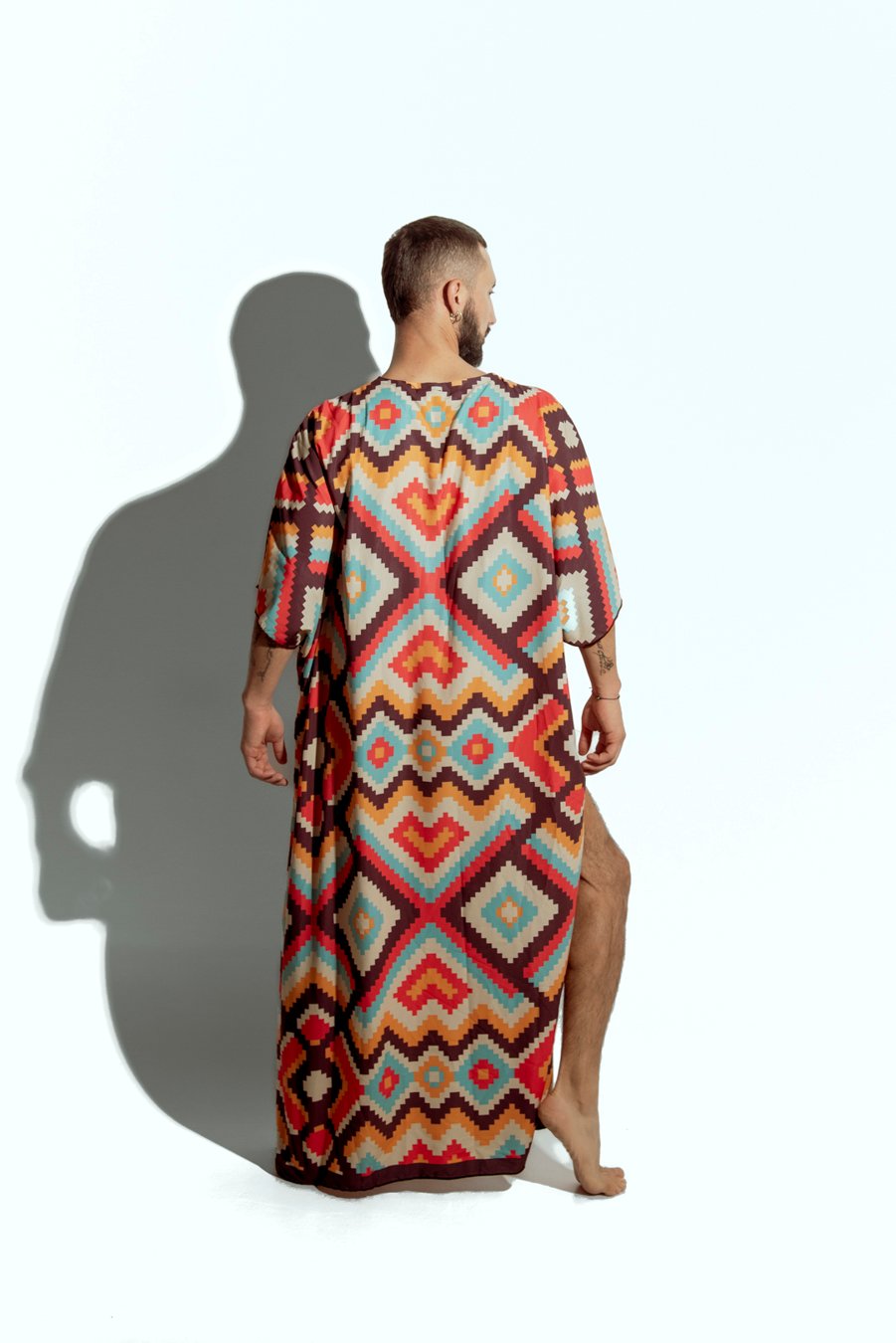 Men's vibrant geometric caftan, perfect for beachwear or resort fashion, designed for gay men who love bold, statement-making style