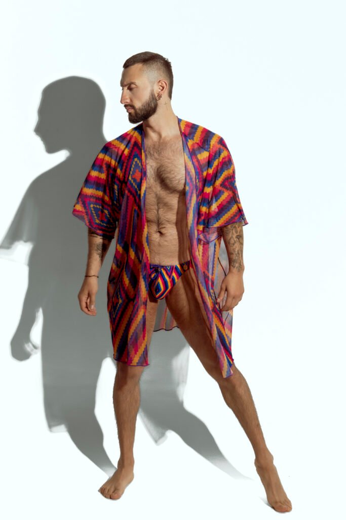 Men's sheer geometric cover-up, perfect for stylish beachwear or poolside fashion, designed for gay men who embrace bold, unique looks