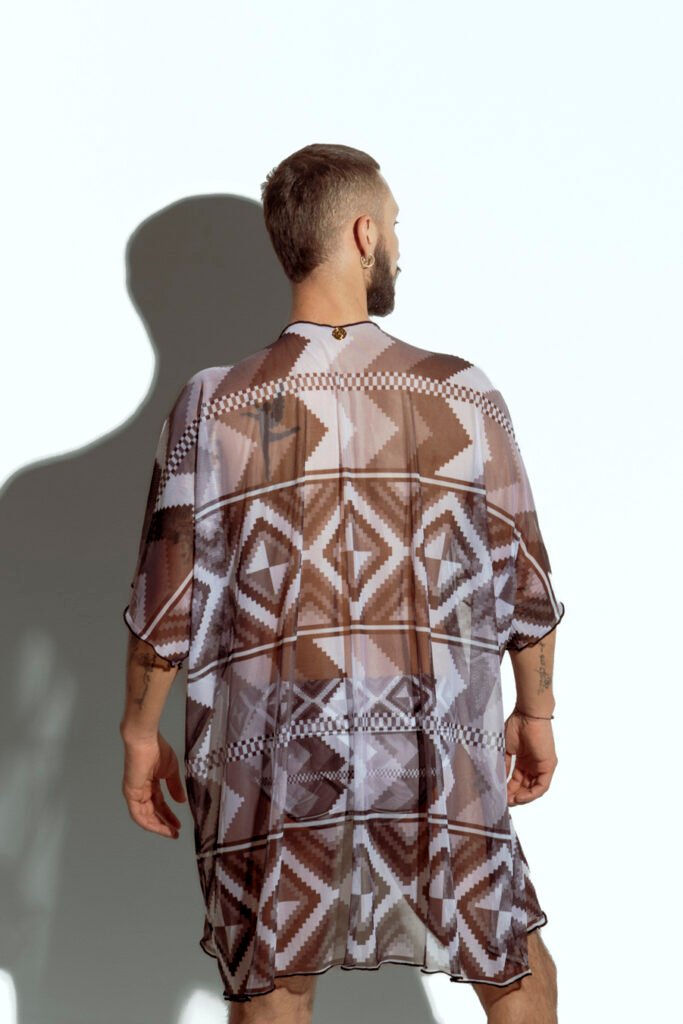 Men's sheer geometric cover-up, perfect for stylish beachwear or poolside fashion, designed for gay men who embrace bold, unique looks