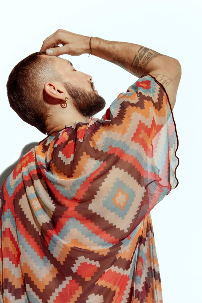 Men's sheer geometric cover-up, perfect for stylish beachwear or poolside fashion, designed for gay men who embrace bold, unique looks