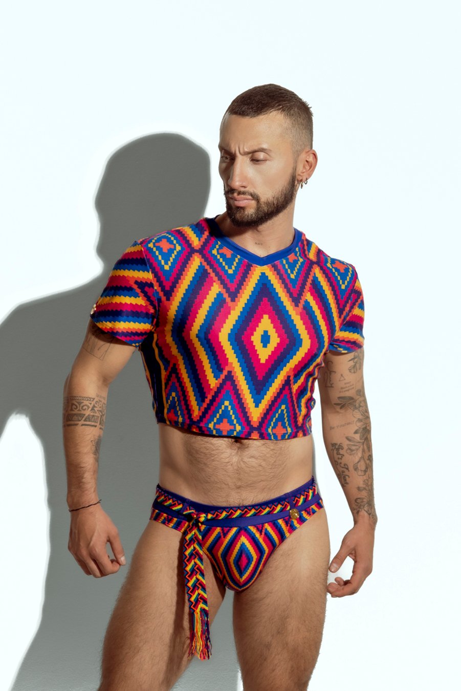 Men's crop top with bold geometric patterns, perfect for fashion-forward gay men seeking unique, trendsetting apparel