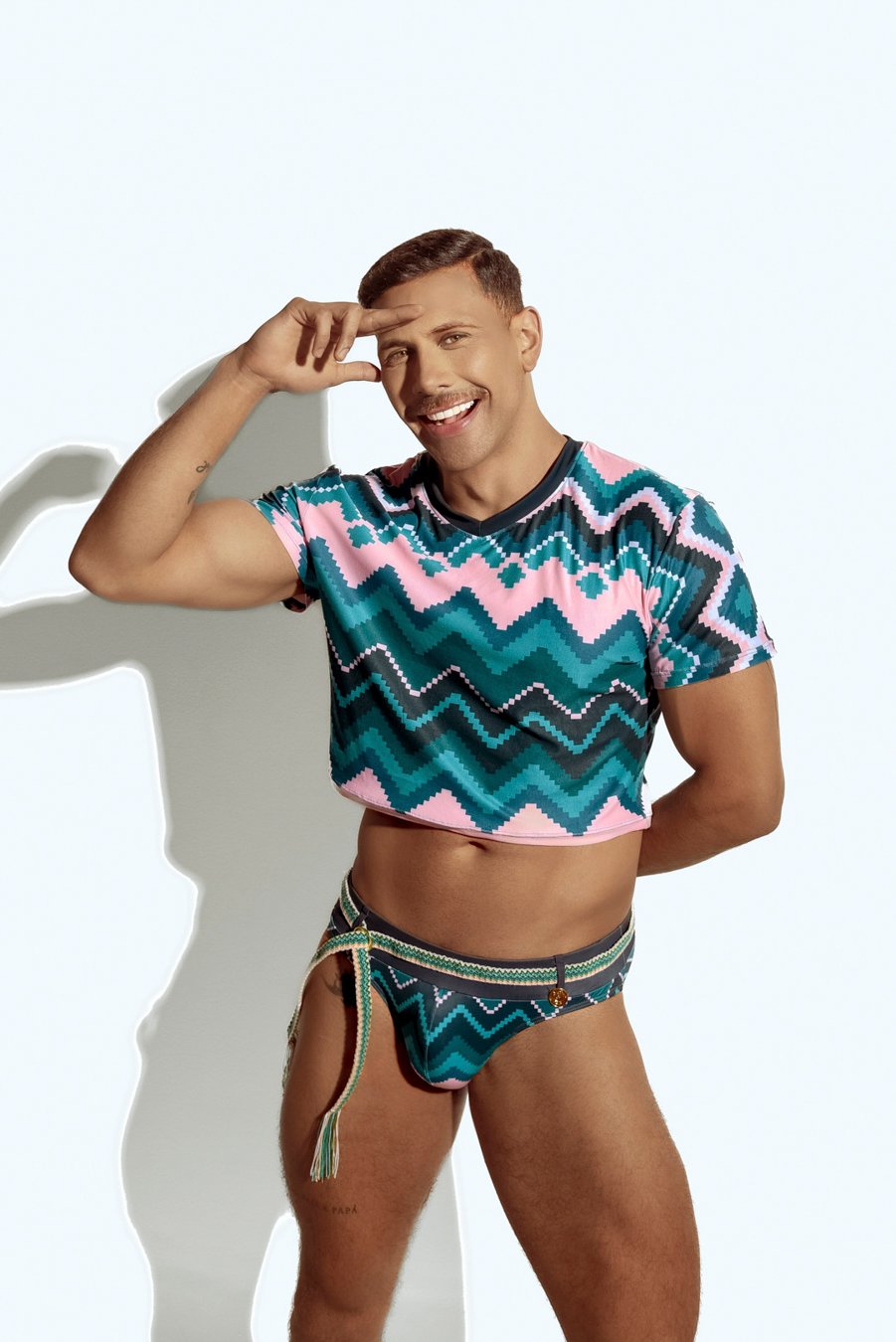 Men's crop top with bold geometric patterns, perfect for fashion-forward gay men seeking unique, trendsetting apparel