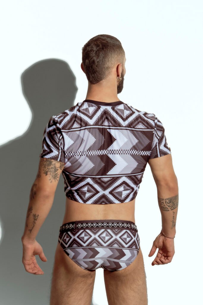 Men's crop top with bold geometric patterns, perfect for fashion-forward gay men seeking unique, trendsetting apparel