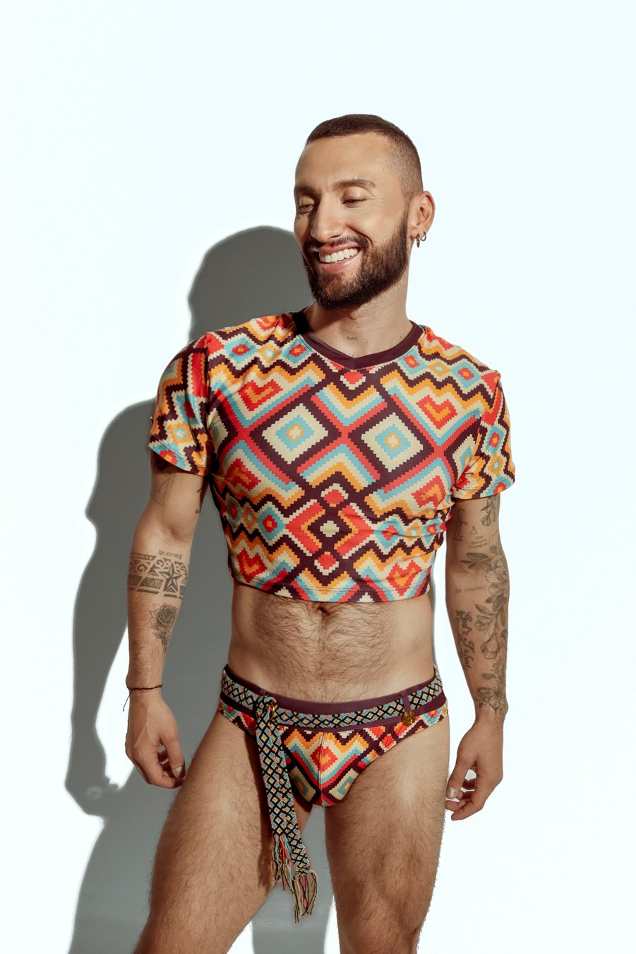 Men's crop top with bold geometric patterns, perfect for fashion-forward gay men seeking unique, trendsetting apparel