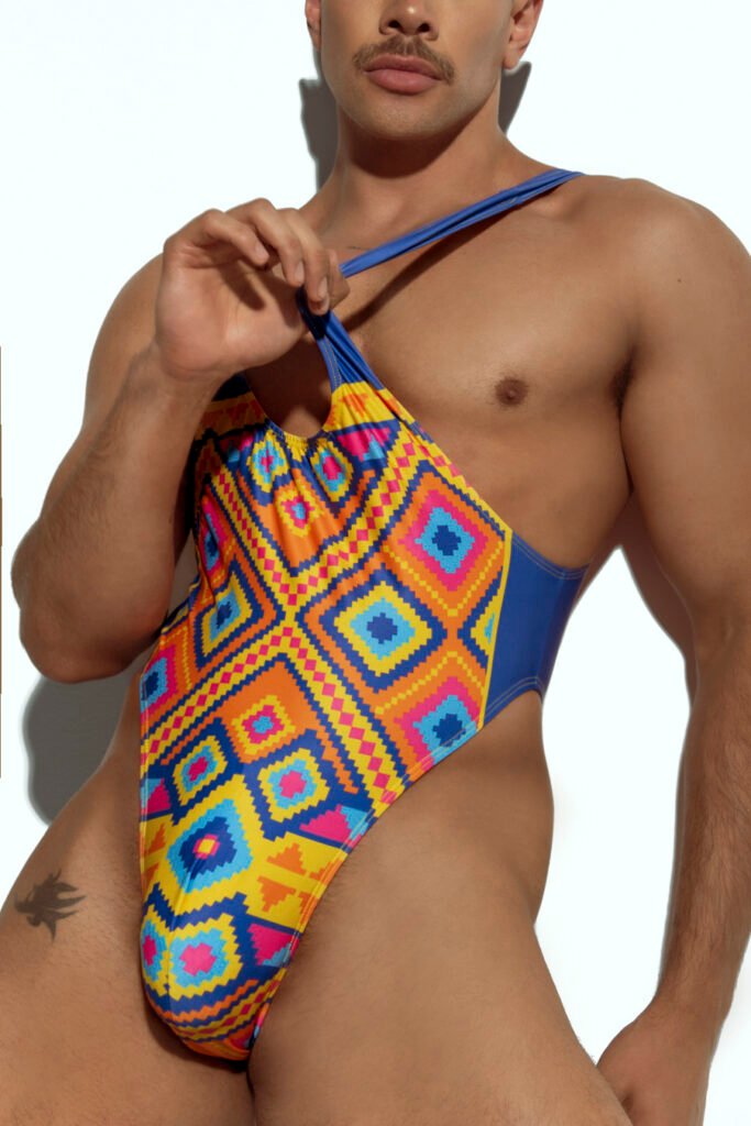 Men's high-cut swim bodysuit with vibrant geometric pattern in multicolor, perfect for gay men seeking bold and eye-catching swimwear