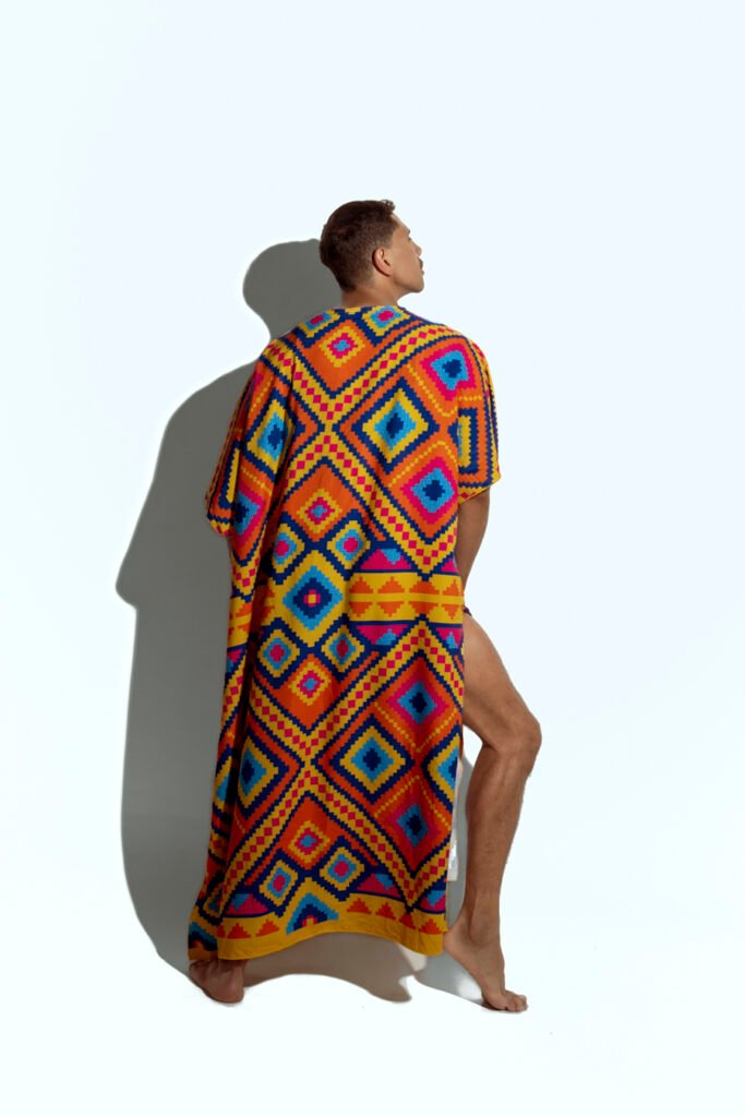 Men's vibrant geometric caftan, perfect for beachwear or resort fashion, designed for gay men who love bold, statement-making style