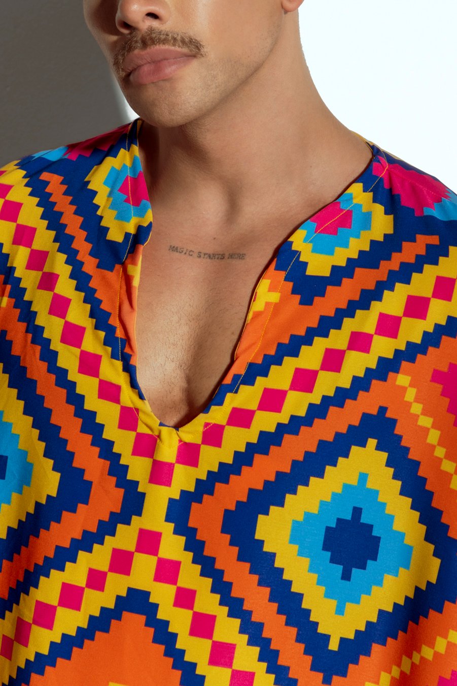 Men's vibrant geometric caftan, perfect for beachwear or resort fashion, designed for gay men who love bold, statement-making style