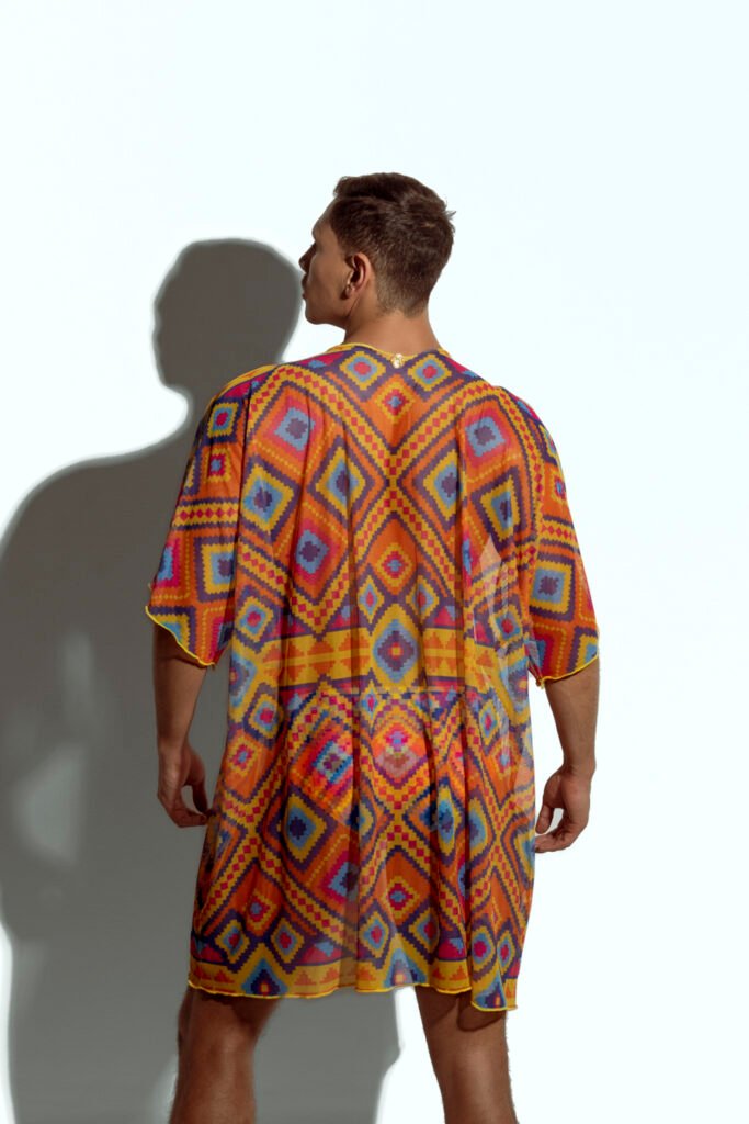 Men's sheer geometric cover-up, perfect for stylish beachwear or poolside fashion, designed for gay men who embrace bold, unique looks