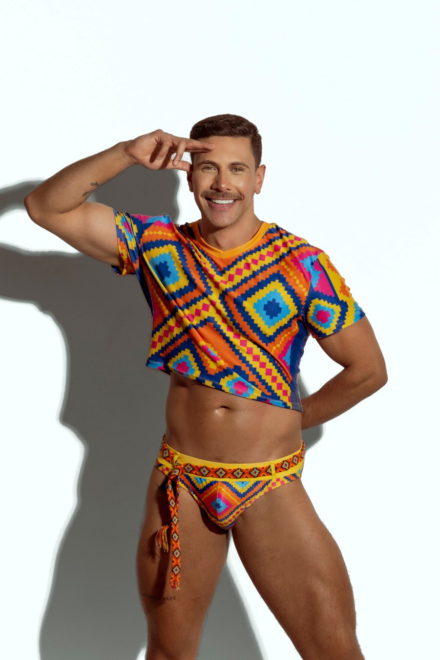 Men's crop top with bold geometric patterns, perfect for fashion-forward gay men seeking unique, trendsetting apparel