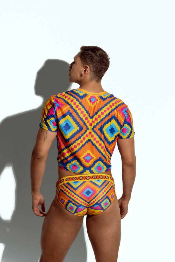 Men's crop top with bold geometric patterns, perfect for fashion-forward gay men seeking unique, trendsetting apparel